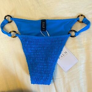 Blue smocked bikini bottoms